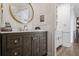 Elegant powder room featuring a stylish vanity and modern fixtures at 1050 Willeo Ct, Marietta, GA 30068