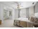 Bright bedroom with an attached sunroom, and a decorative ceiling fan at 1050 Willeo Ct, Marietta, GA 30068