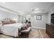 Bright bedroom with an attached sitting area, neutral colors, and recessed lighting at 1050 Willeo Ct, Marietta, GA 30068