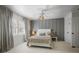 Bright bedroom with an accent wall, decorative ceiling fan, and neutral decor at 1050 Willeo Ct, Marietta, GA 30068