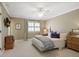 Comfortable bedroom with neutral tones, a patterned blanket, and a window at 1050 Willeo Ct, Marietta, GA 30068