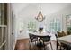 Sun-filled breakfast nook with modern chandelier and window views at 1050 Willeo Ct, Marietta, GA 30068