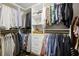 Well-organized walk-in closet with ample hanging space and built-in storage at 1050 Willeo Ct, Marietta, GA 30068