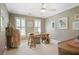 Well-lit office with a wooden desk, neutral walls, and shuttered windows at 1050 Willeo Ct, Marietta, GA 30068