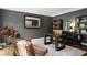 Home office with desk, chair and bookshelves at 1050 Willeo Ct, Marietta, GA 30068