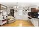 Bright kitchen featuring a breakfast bar, stainless steel appliances, and updated fixtures at 1400 Hidden Circle Dr, Sugar Hill, GA 30518