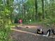 Outdoor disc golf course surrounded by trees and nature offering recreational opportunities at 1740 Fairbanks Sw St, Atlanta, GA 30310