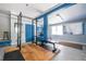 Home gym featuring weightlifting rack and equipment at 1740 Fairbanks Sw St, Atlanta, GA 30310