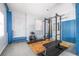 Gym with weight rack, bench, and painted brick walls at 1740 Fairbanks Sw St, Atlanta, GA 30310