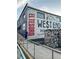 A brewery exterior in West End features eye-catching murals, and outdoor access at 1740 Fairbanks Sw St, Atlanta, GA 30310