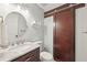 Modern bathroom with a marble countertop vanity and a sliding barn door, adding character at 2789 Townley Cir, Atlanta, GA 30340