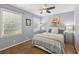 Cozy bedroom with a queen-sized bed, bedside tables, and a ceiling fan at 2789 Townley Cir, Atlanta, GA 30340