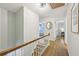 Hallway with hardwood floors leading to bedrooms, offering a seamless flow at 2789 Townley Cir, Atlanta, GA 30340