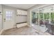 Convenient mudroom with storage cabinets, a bench, and access to the screened-in porch at 2789 Townley Cir, Atlanta, GA 30340