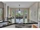 Well-lit kitchen with granite countertops, stainless steel appliances, and a scenic breakfast nook at 5108 Staplehurst Ln, Woodstock, GA 30189
