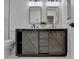 This bathroom features a double sink vanity with sliding doors and a marble countertop at 538 Center Hill Nw Ave, Atlanta, GA 30318