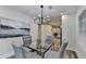 Dining room with modern decor, four seats and open view to the living area at 538 Center Hill Nw Ave, Atlanta, GA 30318