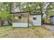 Charming single-story home featuring a covered porch and updated siding at 538 Center Hill Nw Ave, Atlanta, GA 30318