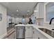 Kitchen with stainless steel dishwasher, white countertops, and open layout to the living area at 538 Center Hill Nw Ave, Atlanta, GA 30318