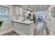 Stylish kitchen with quartz countertops, stainless appliances, and wood-look floors at 538 Center Hill Nw Ave, Atlanta, GA 30318