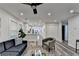 Cozy living room with a modern ceiling fan, recessed lighting, and beautiful flooring at 538 Center Hill Nw Ave, Atlanta, GA 30318