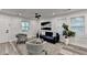 Bright living room with neutral paint, recessed lighting, and large windows at 538 Center Hill Nw Ave, Atlanta, GA 30318