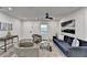 Comfortable living room with recessed lights, modern ceiling fan, and neutral paint colors at 538 Center Hill Nw Ave, Atlanta, GA 30318