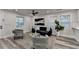 Open-concept living area with modern flooring, natural light and gray furniture at 538 Center Hill Nw Ave, Atlanta, GA 30318