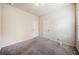 Neutral bedroom with two doors and neutral carpet at 6404 Brookside Se Blvd, Mableton, GA 30126
