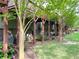 Backyard view of deck with trees at 6404 Brookside Se Blvd, Mableton, GA 30126
