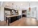 Well-equipped kitchen with a large island, granite countertops, and stainless steel appliances at 6404 Brookside Se Blvd, Mableton, GA 30126