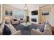Cozy living room featuring a fireplace, comfortable seating, and stylish decor at 6404 Brookside Se Blvd, Mableton, GA 30126