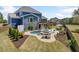 Expansive backyard with an in-ground pool, patio with outdoor seating, and manicured landscaping at 2111 Harmony Dr, Canton, GA 30115