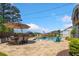 Breathtaking backyard featuring a beautiful pool, relaxing lounge area, and elegant patio at 2111 Harmony Dr, Canton, GA 30115