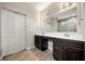 Beautiful bathroom with dual sinks and updated hardware at 2111 Harmony Dr, Canton, GA 30115