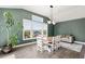 Bright dining area with a large window and modern lighting fixture at 2111 Harmony Dr, Canton, GA 30115