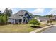Charming home with manicured lawn, attractive landscaping, and inviting curb appeal at 2111 Harmony Dr, Canton, GA 30115