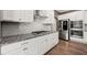 Gourmet kitchen featuring granite counters, stainless steel appliances, and custom cabinetry at 2111 Harmony Dr, Canton, GA 30115