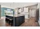 Modern kitchen with large center island, stainless steel appliances, and a breakfast bar at 2111 Harmony Dr, Canton, GA 30115