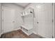Functional mudroom featuring a built-in bench, storage cubbies, and convenient access to doors at 2111 Harmony Dr, Canton, GA 30115