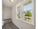 Cozy mudroom with built-in bench and storage, plus lots of natural light from large windows at 2111 Harmony Dr, Canton, GA 30115
