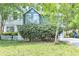 View of front of home showing landscaping and picket fence at 2998 Kenville Ln, Decatur, GA 30034