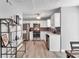 Efficient kitchen features white cabinets, stainless steel appliances, and a modern backsplash for a sleek design at 2998 Kenville Ln, Decatur, GA 30034