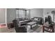 Comfortable living room with gray walls, nice flooring, and lots of comfortable furniture at 2998 Kenville Ln, Decatur, GA 30034