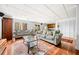 Cozy basement featuring wood flooring, comfortable seating, and plenty of natural light at 3522 Evans Ridge Trl, Atlanta, GA 30340