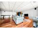 Open layout basement with hardwood floors, a comfortable living area, and space for entertaining at 3522 Evans Ridge Trl, Atlanta, GA 30340