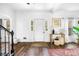 Bright entryway features hardwood floors, white trim, and modern decor at 3522 Evans Ridge Trl, Atlanta, GA 30340