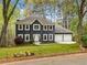 Charming two-story home features manicured front lawn and two-car garage at 3522 Evans Ridge Trl, Atlanta, GA 30340