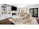 Spacious living room with a stone fireplace and access to an outdoor deck at 3522 Evans Ridge Trl, Atlanta, GA 30340