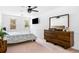 Bright main bedroom with a large mirror and windows with natural light at 3522 Evans Ridge Trl, Atlanta, GA 30340